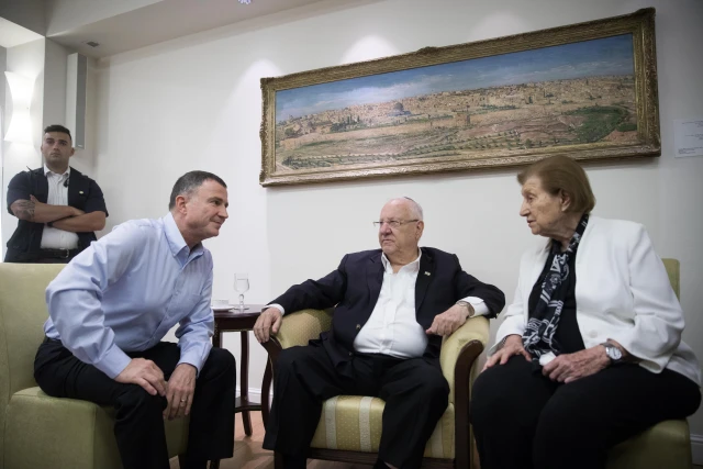 Reuma Weizman, widow of Israel's 7th President, and then-Knesset Chairman Yuli Edelstein speak with then-President Reuven Rivlin at the President’s Residence in Jerusalem on June 6, 2019.
Photo: Hadas Parush/Flash90
