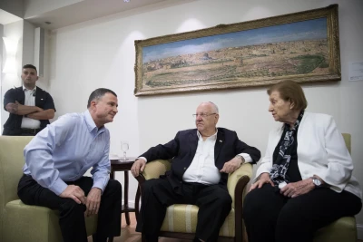 Reuma Weizman, widow of Israel's 7th President, and then-Knesset Chairman Yuli Edelstein speak with then-President Reuven Rivlin at the President’s Residence in Jerusalem on June 6, 2019.
Photo: Hadas Parush/Flash90