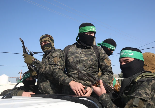 Palestinian members of Izz ad-Din al-Qassam Brigades, the armed wing of the Hamas movement seen during a patrol in Khan Younis, in the southern Gaza Strip on January 26, 2020. Photo by Abed Rahim Khatib/Flash90