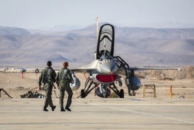 Israeli air force pilots walk to their plane at the Ovda air force base, Southern Israel on October 24, 2021. Photo by Olivier Fitoussi/Flash90