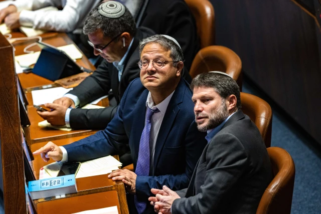 MK Orit Struk with Religious Zionist party head MK Bezalel Smotrich with Head of the Otzma Yehudit party MK Itamar Ben Gvir at a vote in the assembly hall of the Knesset, the Israeli parliament in Jerusalem, on December 28, 2022. Photo by Olivier Fitoussi/Flash90