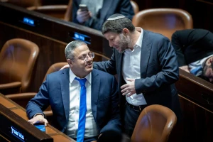 Itamar Ben Gvir and Bezalel Smotrich attend a plenum session on forming the government, in the Israeli parliament, on December 29, 2022. Photo by Yonatan Sindel/Flash90