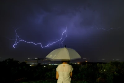 Lightning illuminates the sky over the over the Naftali Mountains and the Hula Valley, in Israel, during a storm on June 3, 2023 (Photo: Ayal Margolin/Flash90).