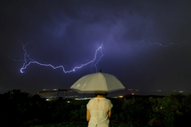 Lightning illuminates the sky over the over the Naftali Mountains and the Hula Valley, in Israel, during a storm on June 3, 2023 (Photo: Ayal Margolin/Flash90).