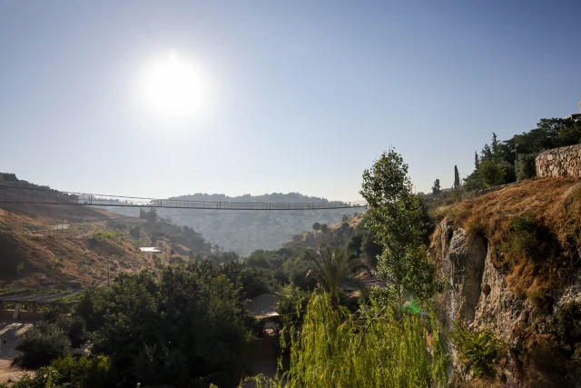 View of a new rope bridge, crossing from the Ben Hinnom valley to Mount Zion, in the Old city of Jerusalem, on July 4, 2023. Photo by Chaim Goldberg/Flash90