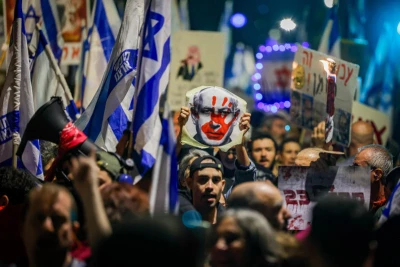 Israelis protest against Israeli Prime Minister Benjamin Netanyahu, near the Prime Minister Residence in Jerusalem, November 25, 2023. Photo by Chaim Goldberg/Flash90