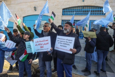 Palestinians protest against freezing of aid for the UNRWA agency for Palestinians refugees in the West Bank city of Ramallah, February 7, 2024 (Photo: Flash90).