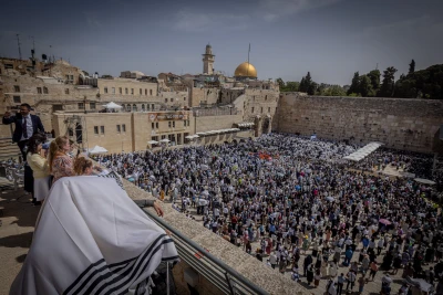 Jewish worshippers attend the Cohen Benediction priestly blessing at the Western Wall in Jerusalem's Old City, during the Jewish holiday of Passover, April 25, 2024. Photo by Chaim Goldberg/Flash90