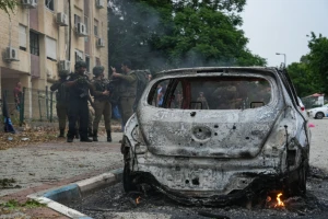 Israeli security forces at the scene where a rocket fired from Lebanon into Northern Israel hit the northern Israeli city of Kiryat Shmona, May 10, 2024 (Photo: Ayal Margolin/Flash90).