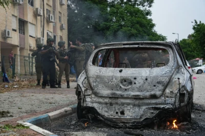 Israeli security forces at the scene where a rocket fired from Lebanon into Northern Israel hit the northern Israeli city of Kiryat Shmona, May 10, 2024 (Photo: Ayal Margolin/Flash90).