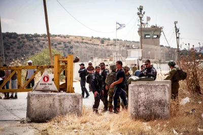 Israeli soldiers guard during a protest of Jewish settlers outside the West Bank city of Nablus, in response to the car ramming attack last night, May 30, 2024. Photo by Nasser Ishtayeh/Flash90