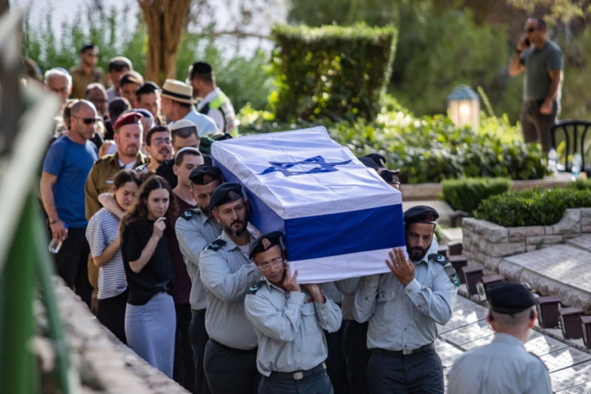 Family and friends of Israeli soldier Senior Staff Sergeant Major Elon Waiss attend his funeral at the Mount Herzl Military Cemetery in Jerusalem on June 16, 2024. He was killed in combat in the southern Gaza Strip (Photo: Oren Ben Hakoon/Flash90).
