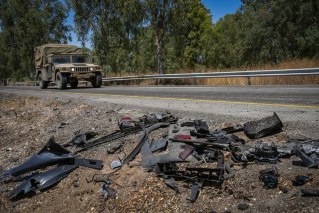 The remains of the vehicle hit by a missile fired from Lebanon that killed Noa and Nir Baranes near Nafah Junction, in the Golan Heights, July 10, 2024 (Photo: Ayal Margolin/Flash90).