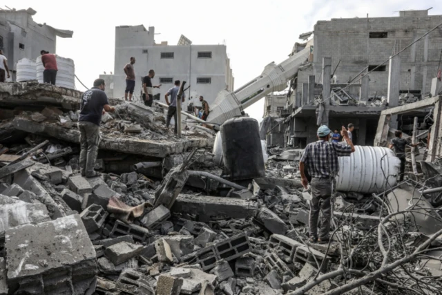 Palestinians inspect the Abdullah Azzam Mosque after an Israeli air strike, in the Nuseirat camp in the central Gaza Strip, on July 17, 2024 (Photo: Abed Rahim Khatib/Flash90).