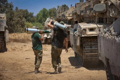 Israeli soldiers seen at a staging area near the Israeli-Gaza border, southern Israel, July 21, 2024. Photo by Oren Cohen/Flash90