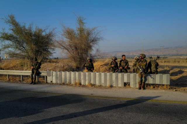 Israeli security forces at the scene of a shooting attack in the Jordan Valley, on August 11, 2024. Photo by Michael Giladi/Flash90