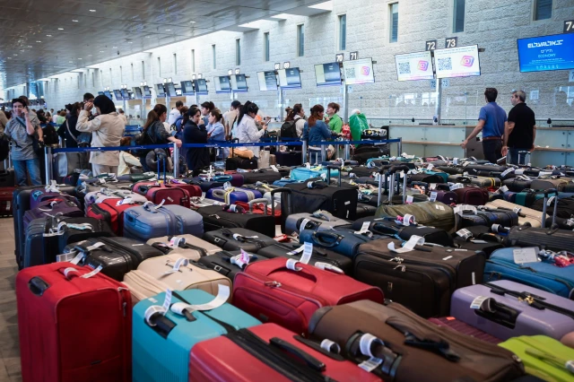Travellers at Ben Gurion International Airport where flights were being delayed, as the workers of the airport went on strike, in a protest for the release of Israelis held hostage by Hamas terrorists in Gaza, on September 2, 2024. Photo by Avshalom Sassoni/Flash90