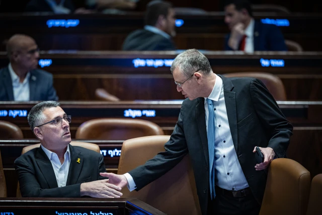 Minister Gideon Sa'ar with Minister of Justice Yariv Levin attends a plenum session at the assembly hall of the Knesset, the Israeli parliament in Jerusalem on November 6, 2024. Photo by Yonatan Sindel/Flash90