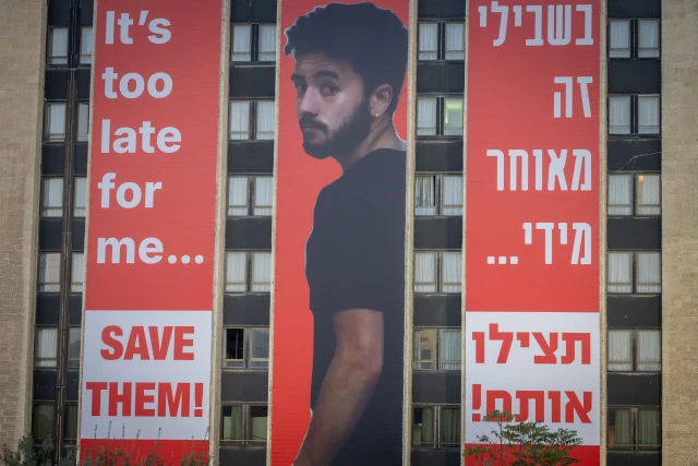 A picture of slain Israeli-American hostage Hersh Goldberg Polin hang on a building in Jerusalem, December 3, 2024. Photo by Chaim Goldberg/Flash90