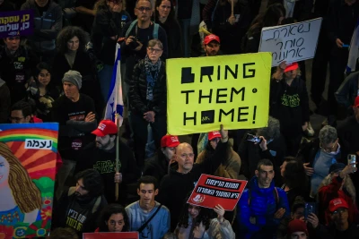 Demonstrators protest against the Israeli government and for the release of Israelis held hostage in the Gaza Stripc outside Hakirya Base in Tel Aviv, January 11, 2025. Photo by Itai Ron/Flash90