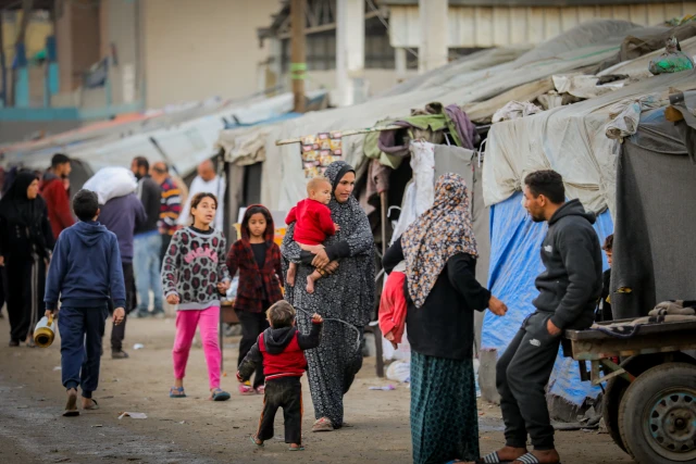 download high resolution
download low resolution
add to lightbox
file name:
F250113ALH07

File Size:
5968 KB

caption (en):
Displaced Palestinians living around their tents, in Deir al-Balah, in the central Gaza Strip, on January 13, 2025. Photo by Ali Hassan/Flash90