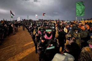 Members of the Al-Qassam Brigades guard in Khan Yunis, February 20, 2025. Saeed Mohammed/Flash90
