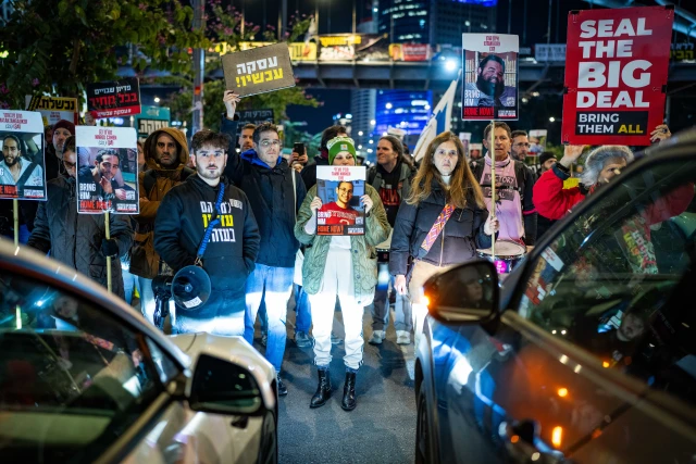 Demonstrators protest for the release of Israelis held hostage in the Gaza Strip, outside Hakirya Base in Tel Aviv, February 26, 2025. Photo by Erik Marmor/Flash90