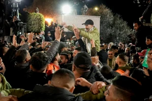 Friends and family members welcome Palestinian prisoners released from Israeli prisons, as they arrive at Ramallah Cultural Palace in the West Bank city of Ramallah, February 27, 2025. Photo by FLASH90