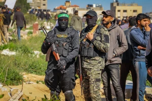 Members of the Al-Qassam Brigades, the military wing of Hamas and mourners attend the funeral of Al-Qassam fighters who were killed during the war between Israel and Hamas in the Al-Shati camp, in Gaza City, February 28, 2025. Photo by Khalil Kahlout/Flash90