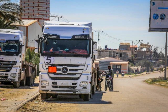 Palestinian trucks parked near the Kerem Shalom crossing, east of the city of Rafah, in the southern Gaza Strip, after Israel has stopped the entry of all humanitarian aid into Gaza, March 2, 2025. Photo by Abed Rahim Khatib/Flash90