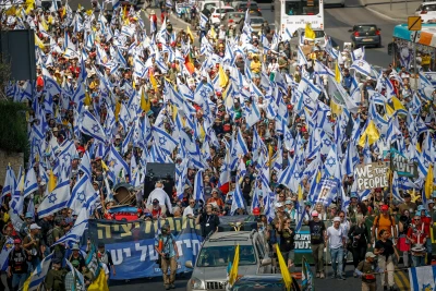 Israelis attend a protest march against the decision of Israeli prime minister Benjamin Netanyahu to fire head of Shin Bat Ronen Bar, at the entrance to Jerusalem, March 19, 2025. Photo by Yonatan SIndel/Flash90