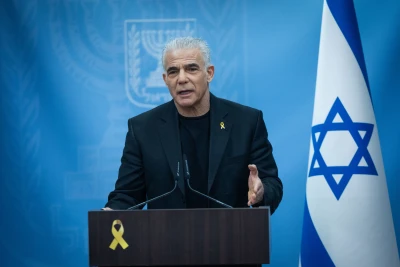 Head of opposition and head of the Yesh Atid party MK Yair Lapid leads a faction meeting at the Knesset, the Israeli parliament in Jerusalem, on March 31, 2025. Photo by Yonatan Sindel/Flash90