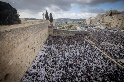 Jewish worshippers pray at the Western Wall, Judaism's holiest prayer site, in Jerusalem's Old City, during the Cohen Benediction priestly blessing at the Jewish holiday of Passover, April 15, 2025. Photo by Chaim Goldberg/Flash90