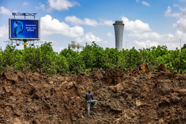 Israeli security forces at the site where a missile fired from Yemen hit an area of Ben Gurion Airport, May 4, 2025. Photo by Chaim Goldberg/Flash90