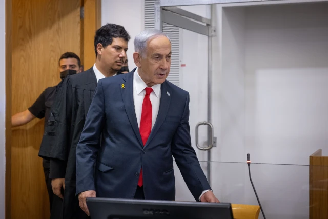 Israeli Prime Minister Benjamin Netanyahu arrives to the courtroom at the Distrcit court in Tel Aviv, before the start of his testimony in the trial against him, May 12, 2025. Photo by Miriam Alster/Flash90