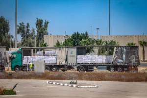Trucks loaded with humanitarian aid seen before entering the Gaza Strip, on the Israeli side of the border with the Gaza Strip, May 20, 2025. Photo by Flash90