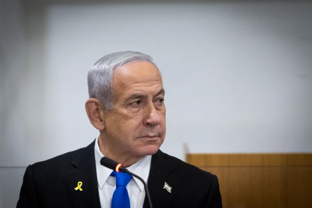 Israeli Prime Minister Benjamin Netanyahu arrives to the courtroom at the Distrcit court in Tel Aviv, before the start of his testimony in the trial against him, June 3, 2025. Photo by Chaim Goldberg/Flash90