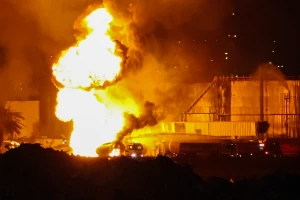 fire rises from the Bazan power plant in the northern Israeli city of Haifa, June 15, 2025. Photo by Mordekay Baliti/Flash90