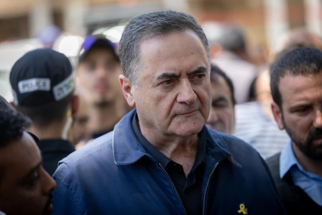 Israeli minister of Defense Yisrael Katz speaks to press at the site of where a missile fired from Iran, hit in the central city of Holon. June 19, 2025. Several Israelis were wounded, some of them badly, in the strike. Photo by Chaim Goldberg/FLASH90