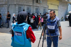 Palestinian journalists report on the war and ongoing humanitarian crisis in the central Gaza Strip, July 26, 2025. Photo by Ali Hassan/Flash90