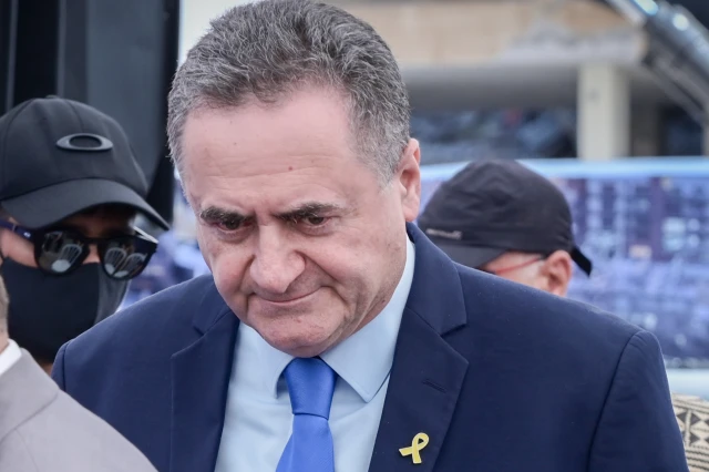 Israeli minister of Defense Yisrael Katz attends a ceremony held when demolishing residential buildings which were hit in an Iranian missile attack in the central Israeli city of Holon last month, July 28, 2025. Photo by Avshalom Sassoni/FLASH90