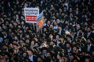 Ultra Orthodox Jewish men block a road during a protest against the jailing of Jewish seminary students who failed to comply with an army recruitment order in Jerusalem on August 07, 2025. Photo by Yonatan Sindel/Flash90
