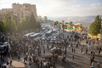 Ultra Orthodox Jewish men block a road during a protest against the jailing of Jewish seminary students who failed to comply with an army recruitment order in Jerusalem on September 18, 2025. Photo by Chaim Goldberg/Flash90
