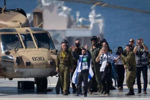 Released hostage Matan Angrest arrives to Ichilov hospital, October 13, 2025. Photo by Chaim Goldberg/Flash90