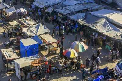 Palestinians shop at a market in Khan Yunis, in the southern Gaza Strip, a few days after a ceasefire agreement between Israel and Hamas, on October 14, 2025. Photo by Abed Rahim Khatib/Flash90
