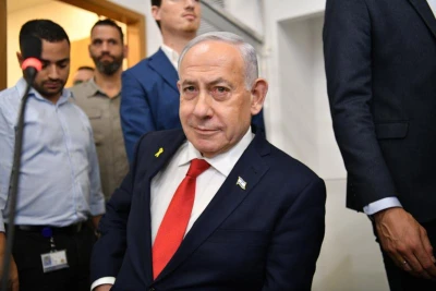 Israeli Prime Minister Benjamin Netanyahu arrives to the courtroom at the District Court in Tel Aviv, in the trial against him, October 15, 2025. Photo: Flash 90 by Reuven Kastro