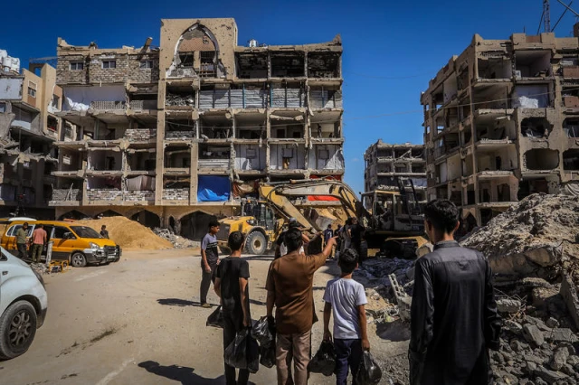 Hamas uses bulldozers to search for the bodies of Israeli hostages held in Gaza, in Khan Yunis, in the southern Gaza Strip, on October 18, 2025. Photo by Saeed Mohammed/Flash90