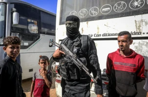 Masked members of the Palestinian Hamas movement arrest several members of Yasser Abu Shabab, who are accused of collaborating with the Israeli army in the Gaza Strip, according to Hamas members, in the southern Gaza Strip. Photo by Saeed Mohammed/Flash90.