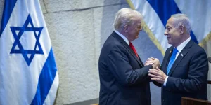U.S. President Donald Trump with Israeli Prime Minister Benjamin Netanyahu during a special plenum session in honor of President Trump at the Knesset, Israel’s parliament in Jerusalem, on October 13, 2025. Photo by Yonatan Sindel/Flash90