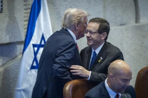U.S. President Donald Trump and Israeli President Isaac Herzog seen during a special plenum session in honor of President Trump at the Knesset, Israel’s parliament in Jerusalem, on October 13, 2025. Photo by Yonatan Sindel/Flash90